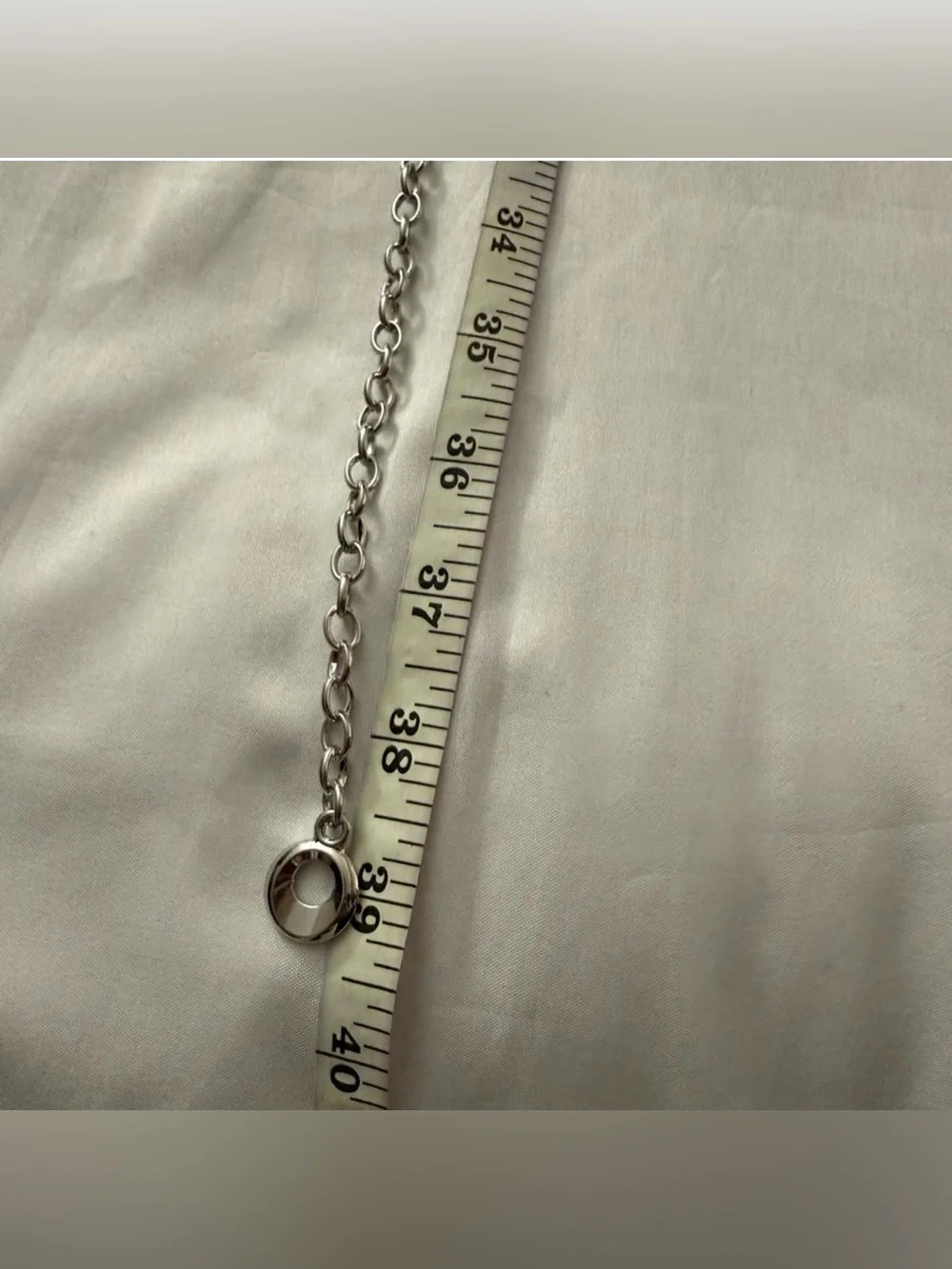 Silver tone metallic skinny chain belt